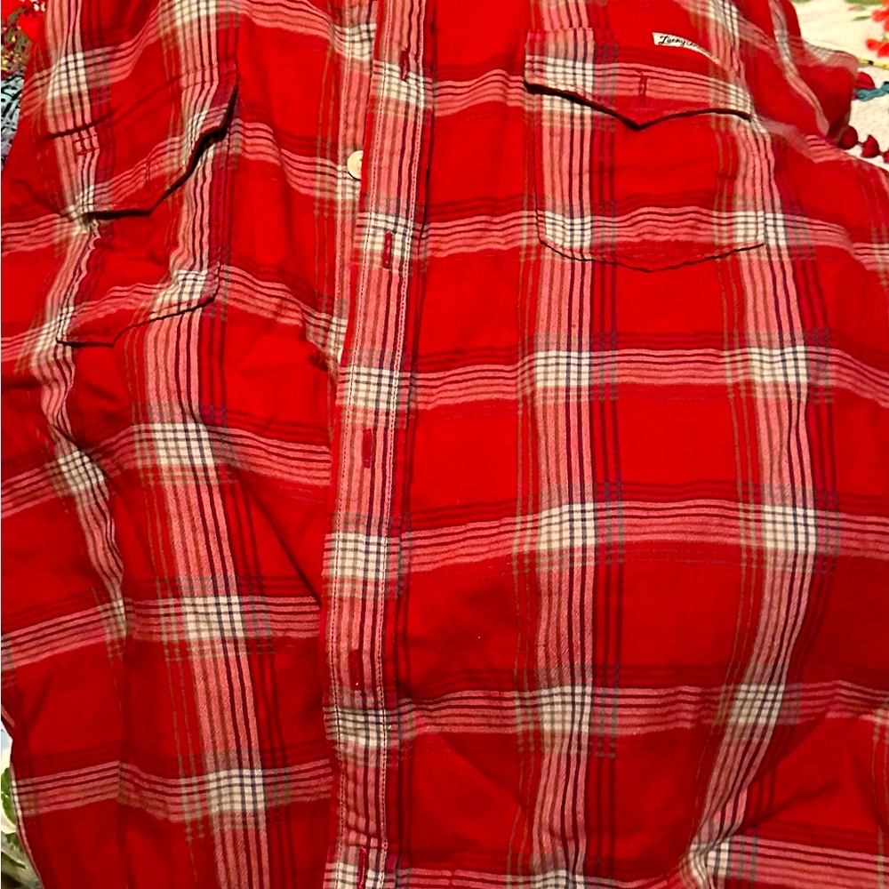 A red plaid men’s XL button down, received as a gift and cannot fit
